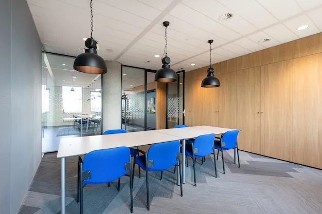 [freepicdownloader.com] meeting room interior modern office with long wooden table chairs around it normal 11zon